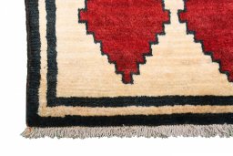 Full view of 2000s Persian Gabbeh rug from Iran / Persia, 190 × 95 cm in Beige tones