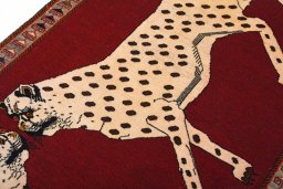 Full view of 2000s Persian Gabbeh rug from Iran / Persia, 217 × 85 cm in Red tones
