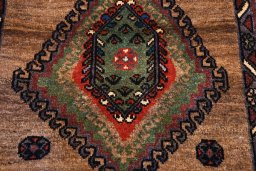 Backside of handmade 2000s Persian Gabbeh rug showing knot structure and weave density