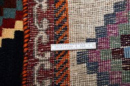 Close-up detail of 2000s Persian Gabbeh rug from Iran / Persia showing Wool weave