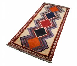 Close-up detail of 2000s Persian Gabbeh rug from Iran / Persia showing Wool weave