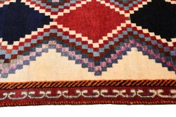 Close-up detail of 2000s Persian Gabbeh rug from Iran / Persia showing Wool weave