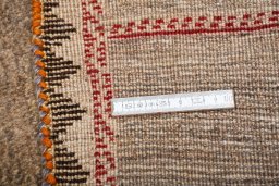 Close-up detail of 2000s Persian Gabbeh rug from Iran / Persia showing Wool weave