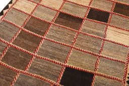 Central medallion detail of 2000s Persian Gabbeh rug from Iran / Persia