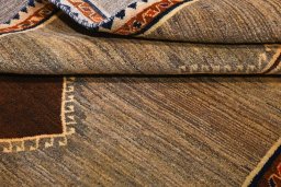 Close-up detail of 2000s Persian Gabbeh rug from Iran / Persia showing Wool weave