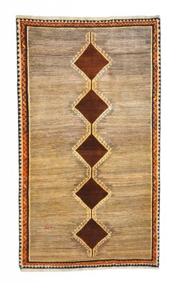 Full view of 2000s Persian Gabbeh rug from Iran / Persia, 225 × 130 cm in Beige tones