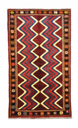 Full view of 2000s Persian Gabbeh rug from Iran / Persia, 228 × 130 cm in Red tones
