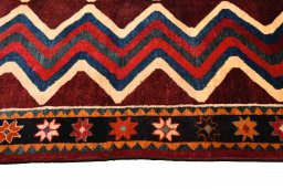 Close-up detail of 2000s Persian Gabbeh rug from Iran / Persia showing Wool weave