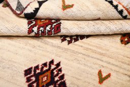 Close-up detail of 2000s Persian Gabbeh rug from Iran / Persia showing Wool weave