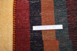 Close-up detail of 2000s Persian Gabbeh rug from Iran / Persia showing Wool weave