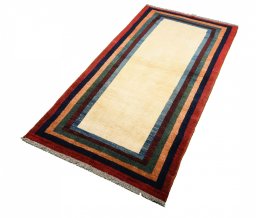Close-up detail of 2000s Persian Gabbeh rug from Iran / Persia showing Wool weave