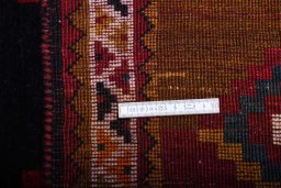 Close-up detail of 2000s Persian Gabbeh rug from Iran / Persia showing Wool weave