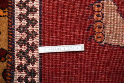 Surface texture of 2000s Persian Gabbeh rug with natural Wool and intricate pattern