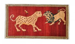 Full view of 2000s Persian Gabbeh rug from Iran / Persia, 200 × 106 cm in Red tones