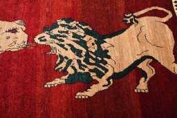Close-up detail of 2000s Persian Gabbeh rug from Iran / Persia showing Wool weave
