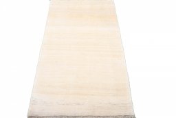 Surface texture of 2000s Persian Gabbeh rug with natural Wool and intricate pattern