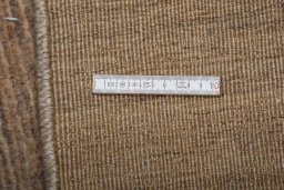 Corner detail of New Persian Gabbeh rug showing border pattern and Wool pile