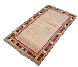 Close-up detail of 2000s Persian Gabbeh rug from Iran / Persia showing Wool weave