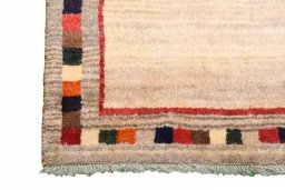 Close-up detail of 2000s Persian Gabbeh rug from Iran / Persia showing Wool weave