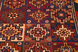Central medallion detail of 2000s Persian Gabbeh rug from Iran / Persia