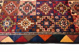 Close-up detail of 2000s Persian Gabbeh rug from Iran / Persia showing Wool weave