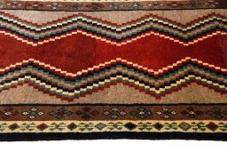 Central medallion detail of 2000s Persian Gabbeh rug from Iran / Persia