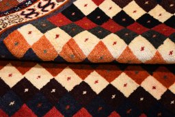 Full view of 2000s Persian Gabbeh rug from Iran / Persia, 160 × 115 cm in Multi Color tones