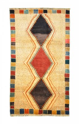 Full view of 2000s Persian Gabbeh rug from Iran / Persia, 207 × 120 cm in Beige tones