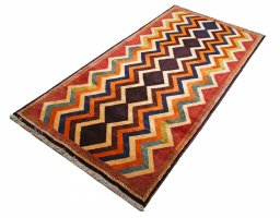 Close-up detail of 2000s Persian Gabbeh rug from Iran / Persia showing Wool weave