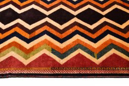 Close-up detail of 2000s Persian Gabbeh rug from Iran / Persia showing Wool weave