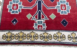 Central medallion detail of 2000s Persian Gabbeh rug from Iran / Persia