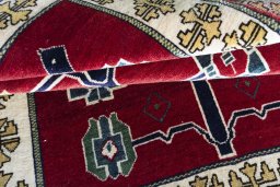 Full view of 2000s Persian Gabbeh rug from Iran / Persia, 162 × 110 cm in Red tones