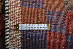 Close-up detail of 2000s Persian Gabbeh rug from Iran / Persia showing Wool weave