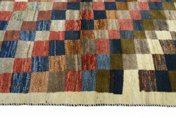 Close-up detail of 2000s Persian Gabbeh rug from Iran / Persia showing Wool weave