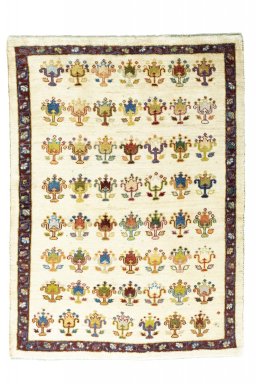 Full view of 2000s Persian Gabbeh rug from Iran / Persia, 170 × 124 cm in Beige tones