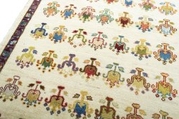 Backside of handmade 2000s Persian Gabbeh rug showing knot structure and weave density