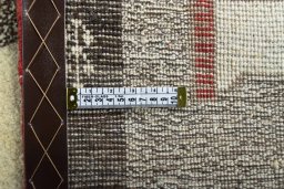 Close-up detail of 2000s Persian Gabbeh rug from Iran / Persia showing Wool weave