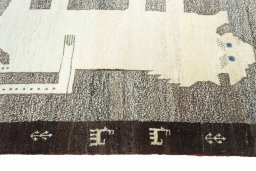 Close-up detail of 2000s Persian Gabbeh rug from Iran / Persia showing Wool weave