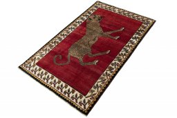 Corner detail of 2000s Persian Gabbeh rug showing border pattern and Wool pile
