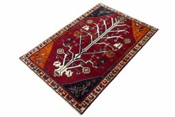Corner detail of 2000s Persian Gabbeh rug showing border pattern and Wool pile