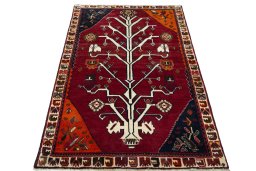 Surface texture of 2000s Persian Gabbeh rug with natural Wool and intricate pattern