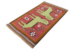 Corner detail of 2000s Persian Gabbeh rug showing border pattern and Wool pile