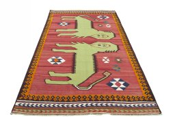 Close-up detail of 2000s Persian Gabbeh rug from Iran / Persia showing Wool weave