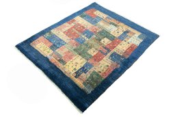 Corner detail of New Persian Gabbeh rug showing border pattern and Wool pile