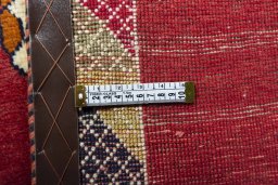 Close-up detail of 2000s Persian Gabbeh rug from Iran / Persia showing Wool weave