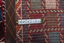 Close-up detail of 2000s Persian Gabbeh rug from Iran / Persia showing Wool weave