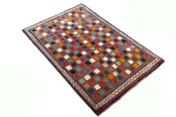 Close-up detail of 2000s Persian Gabbeh rug from Iran / Persia showing Wool weave