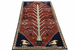 Surface texture of 2000s Persian Gabbeh rug with natural Wool and intricate pattern