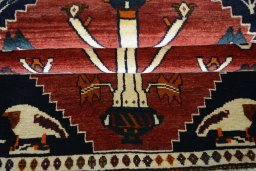 Full view of 2000s Persian Gabbeh rug from Iran / Persia, 176 × 102 cm in Red tones