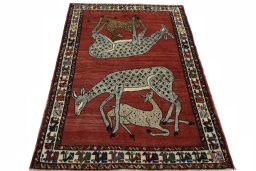 Surface texture of 2000s Persian Gabbeh rug with natural Wool and intricate pattern